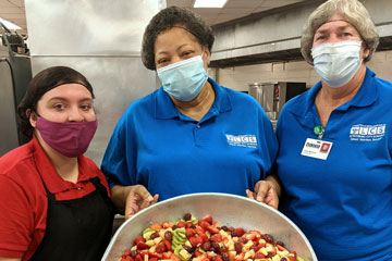 Cafeteria workers in kitchen