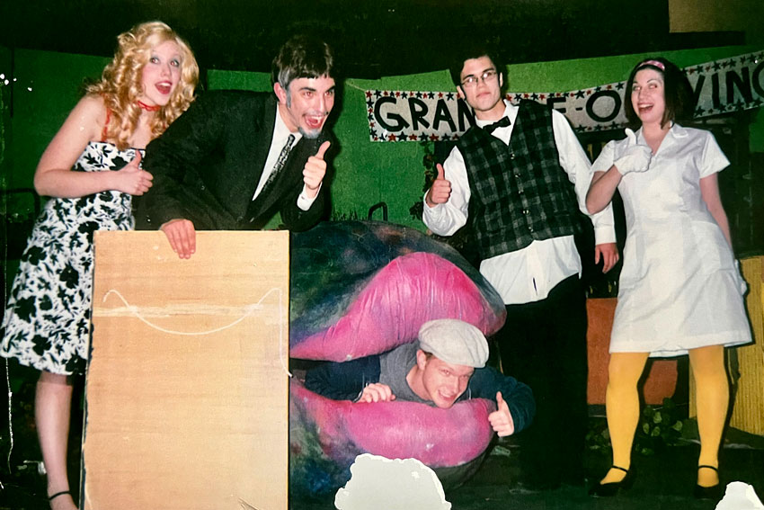 "Little Shop" cast members posing on stage