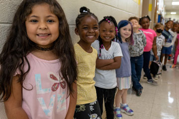 Students lined up in school hallway