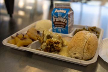 School lunch with carton of milk