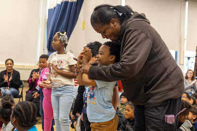 Students cheering during assembly