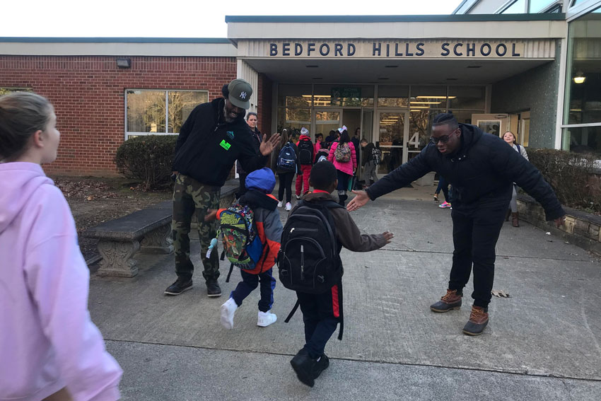 Men2School greeting returning students